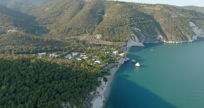 Aerial view of Baia delle Zagare (Zagare Bay) at sunset. It is a small gulf of Gargano, in the province of Foggia, in Puglia, Italy.