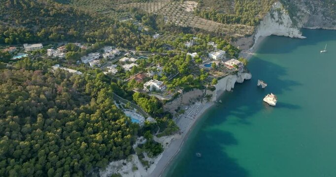 Aerial view of Baia delle Zagare (Zagare Bay) at sunset. It is a small gulf of Gargano, in the province of Foggia, in Puglia, Italy.