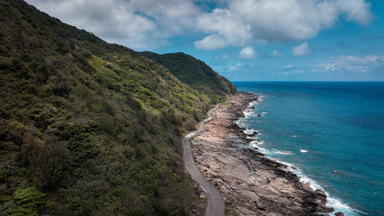 Breathtaking coastal view at Jialeshuei scenic area in Taiwan with winding roads and lush hills