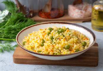 Rice pilaf with vegetables; rice pilaf with carrots and peas