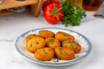 A plate of delicious fried potato patties (Turkish name; patates koftesi)