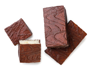 Cake bars in chocolate and halves close-up on white. Top view