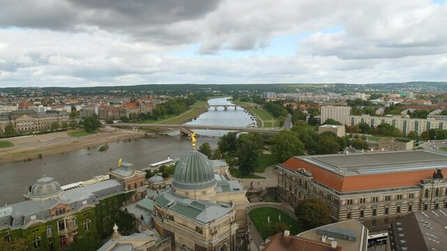 Dresden Sachsen, destroyed Carolabr&uuml;cke Carola Bridge over the Elbe Germany Lipsius-Bau Aerial View from the top of Frauenkirche pan move cloudy sky with Historic and Modern Architecture