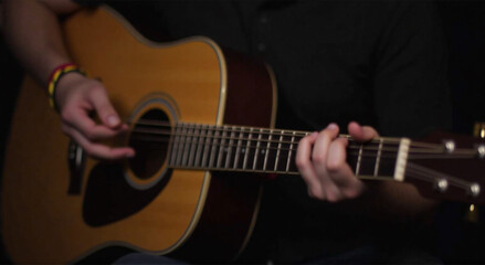 Obraz premium person playing guitar