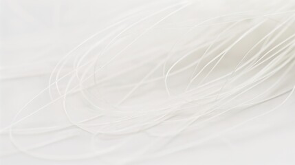 Fototapeta premium Close-up macro detail of dental floss string texture on white surface. Dentistry, oral care products, healthy lifestyle,health magazine, teeth cleaning, dental floss brand