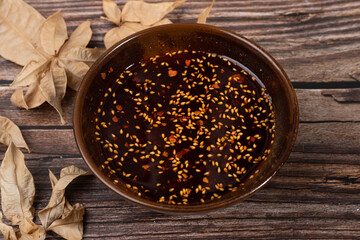 Chili oil dressing in a China bowl