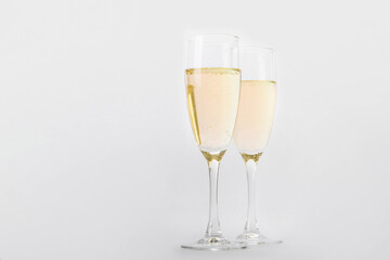 Elegant Champagne Glasses with Sparkling Bubbles.