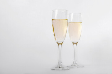 Elegant Champagne Glasses with Sparkling Bubbles.