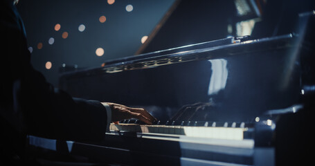 Close Up on Hands of a Talented Anonymous Pianist Making a Masterful Performance on a Grand Piano....