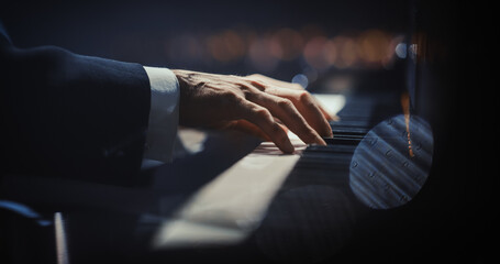 Close Up on Pianist Hands Playing a Mesmerizing Jazz Melody on a Black Grand Piano. Anonymous...