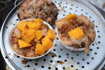 Steamed stuffed tofu in a bamboo basket