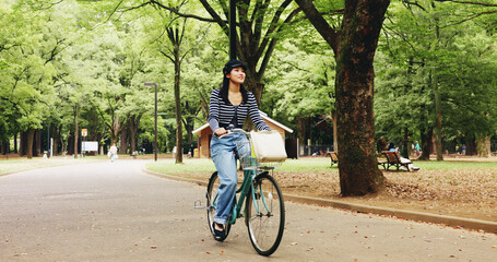 Nature, active and woman with bicycle, travel and commuting in city road or transport for student....
