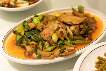 Garlic sprouts on a plate