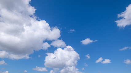 clear blue sky background,clouds with background, Blue sky background with tiny clouds. White fluffy clouds in the blue sky. 
