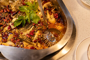 Sichuan spicy bullfrog fish hot pot