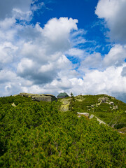 Obraz premium 2024-05-20; View of a mountain hut on top of Mount Szrenica in the Karkonosze Mountains