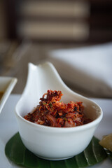 A close-up of a Sri Lankan Lunumiris Dish
