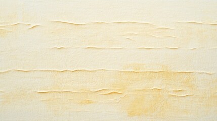 Faded yellow paper texture with soft creases, providing an antique appearance ideal for backgrounds or vintage-themed designs.