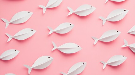 Naklejka premium Playful pink backdrop adorned with paper fish, embodying humor and creativity, perfect for April Fools' Day themed designs and pranks.