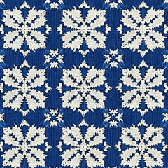 A beautiful blue and white knitted pattern featuring intricate snowflake designs.