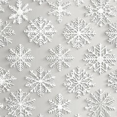 Beautifully intricate white snowflakes on a soft gray background, creating a serene winter atmosphere.