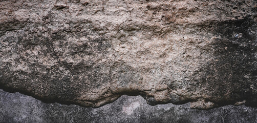 Empty brown rough stone wall on cave for abstract  background and texture. beautiful patterns,...