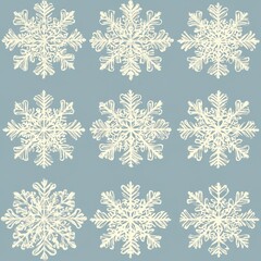 Fototapeta premium A beautiful arrangement of intricately designed snowflakes on a soft blue background, creating a serene winter vibe.