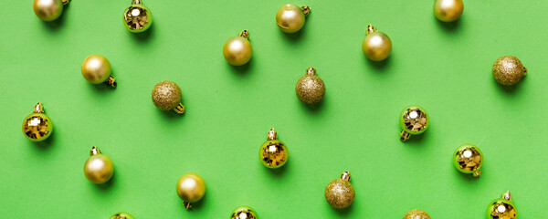 Christmas composition. a pattern of christmas balls on colored background. Flat lay, top view New year decor