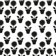 Seamless silhouette pattern of sunflower in a pot