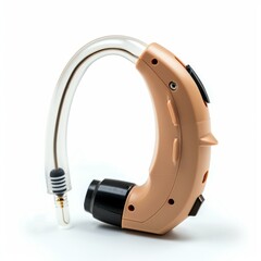 New hearing aid device with ear mold laying on white background
