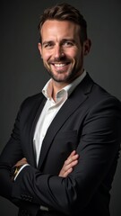 Smiling young woman in formal wear with crossed arms
