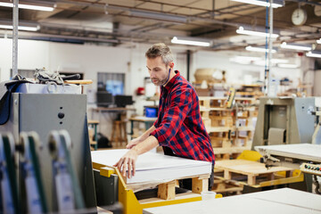 Man working in a printing press office