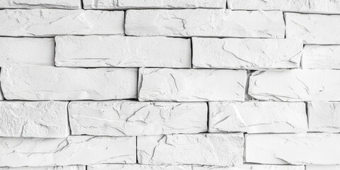 Fototapeta premium Texture background featuring a contemporary white brick wall with a modern design. This modern style creates a clean and stylish aesthetic with its white brick finish.