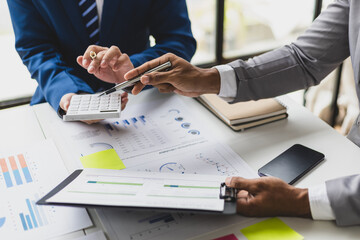 Auditor team working in office. Businessman meeting with financial advisors discussing budget planning and analyzing company financial reports.