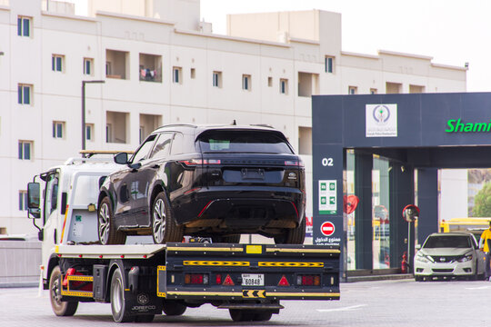 Range Rover Velar on recovery truck in Sharjah City,  United Arab Emirates.