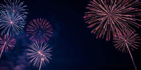 Vibrant blue fireworks illuminating a dark summer night sky in a dazzling display of light and color, fireworks display, event, celebration