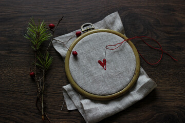 Christmas embroidery, red heart embroidery on the wood table, Christmas handicraft gifts idea, tambour embroidery