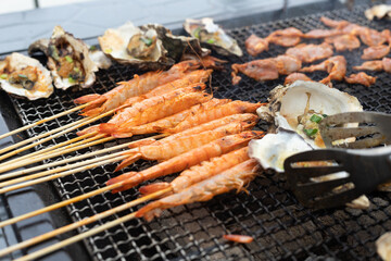 Grilled oyster and prawns liver