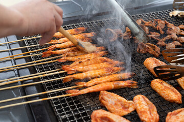 Grilled chicken wing shrimp and county liver