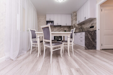 modern dining room with kitchen