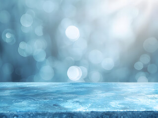 A soft blue bokeh background with a textured surface, ideal for product displays or presentations.