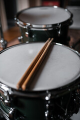 Drum sticks on a snare drum