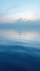 Obraz premium Softly blended blue watercolor brushstrokes create a mesmerizing splash effect on the surface of a tranquil lake at dawn, morning scene, blue hues, calm water