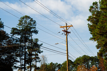 Electric Line Pole or Post in Crisp Autumn Morning Power Lines and Power Grid Trees in Background...
