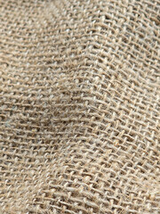 burlap - rough embossed texture of natural fabric close-up background