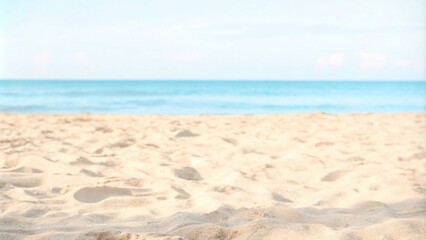 A serene sandy beach under a clear blue sky, with gentle ocean waves lapping at the shore, perfect for a summer getaway.