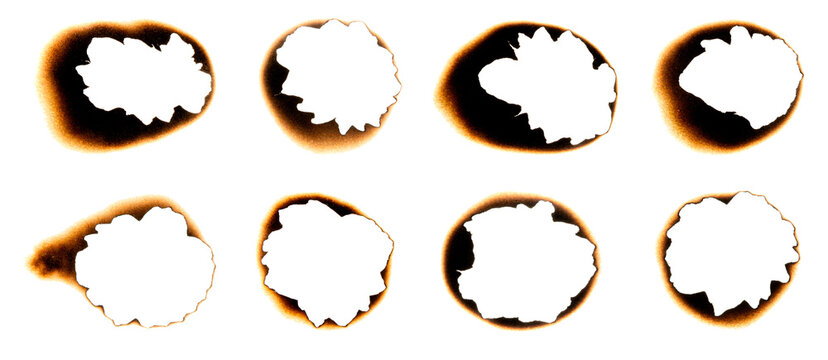Burnt holes in a piece of paper
