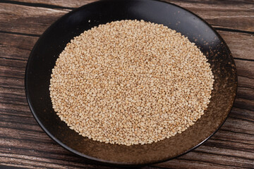 Cooked white sesame seeds in a dish