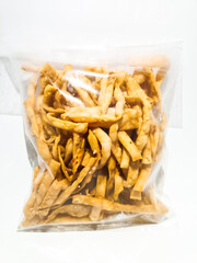 A clear plastic package of crispy prawn sticks (jejari udang), a popular Malaysian snack made from prawn-flavored dough, fried to golden perfection, perfect for any occasion.