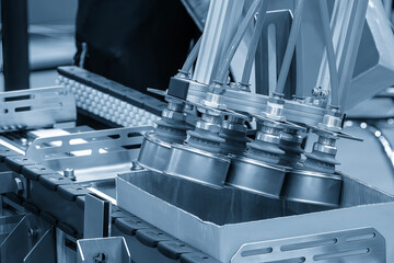 The high technology material handling process in canned food production by robotic system.